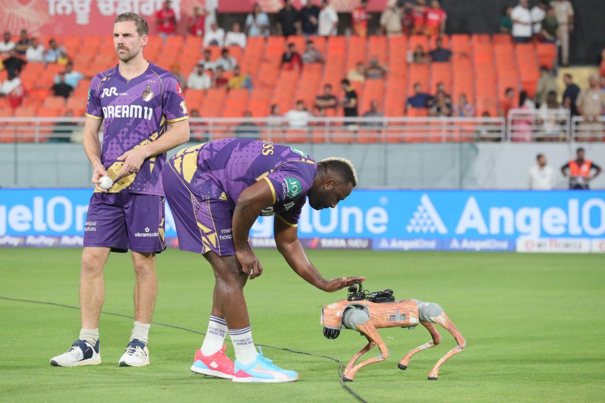 KKR's Andre Russell pets the IPL's new Robot Dog