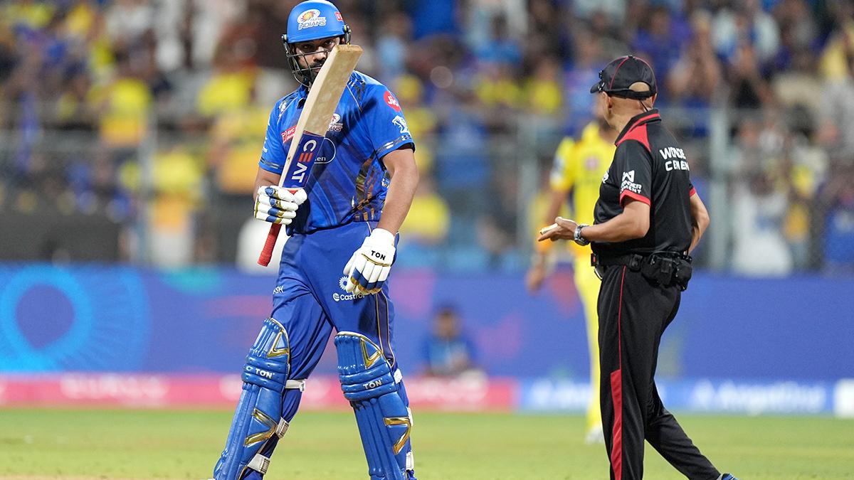 Rohit Sharma celebrates his half-century against CSK on Sunday