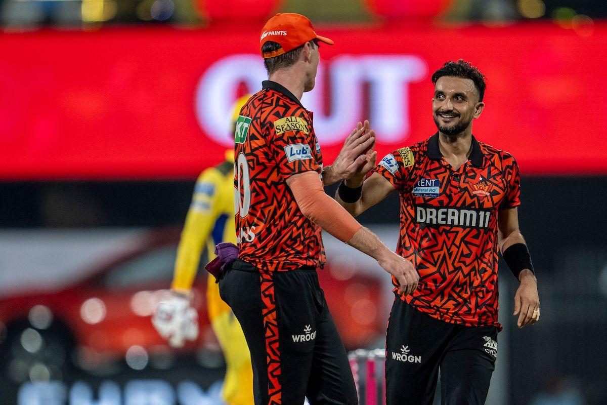 Harshal Patel celebrates the wicket of Noor Ahmad. Harshal took four wickets