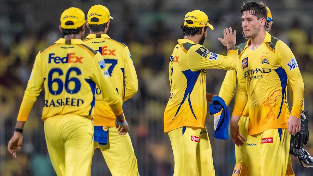 Noor Ahmad celebrates with teammates after dismissing Ishan Kishan