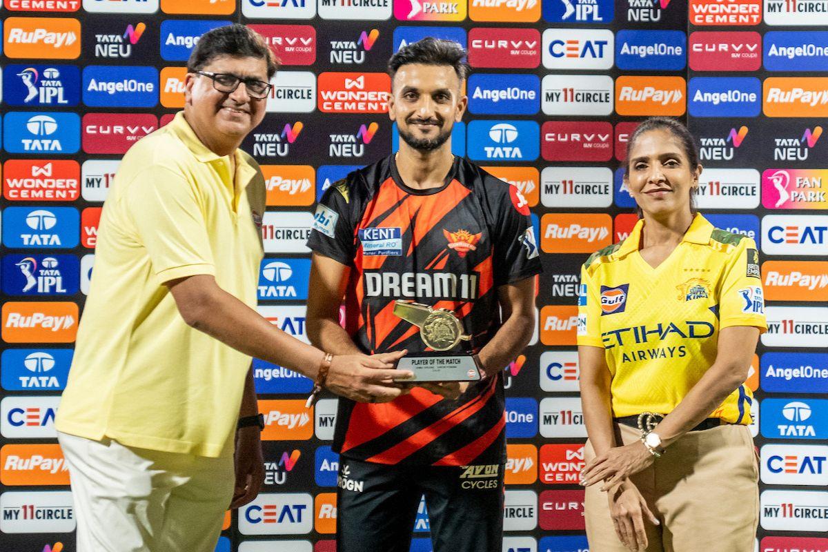 Harshal Patel receives the Player of the Match Award for his 4 for 28 against CSK on Friday