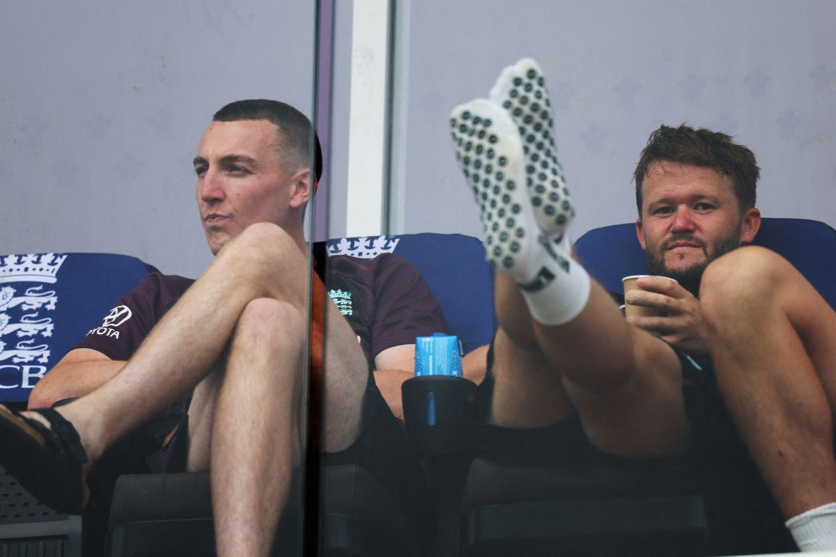 Harry Brook and Ben Duckett show no signs of nerves as they watch proceedings from the dressing room,