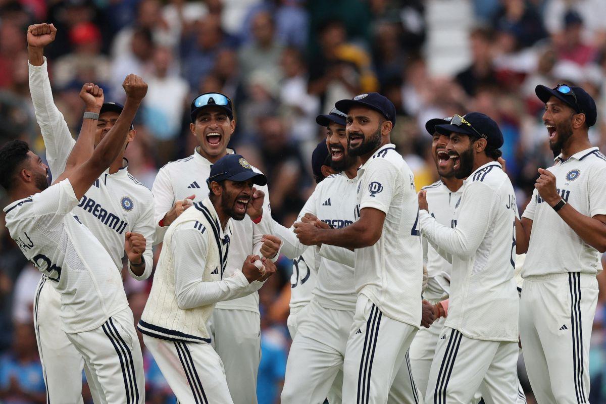  India's Mohammed Siraj celebrates taking the wicket of England's Jamie Overton. 