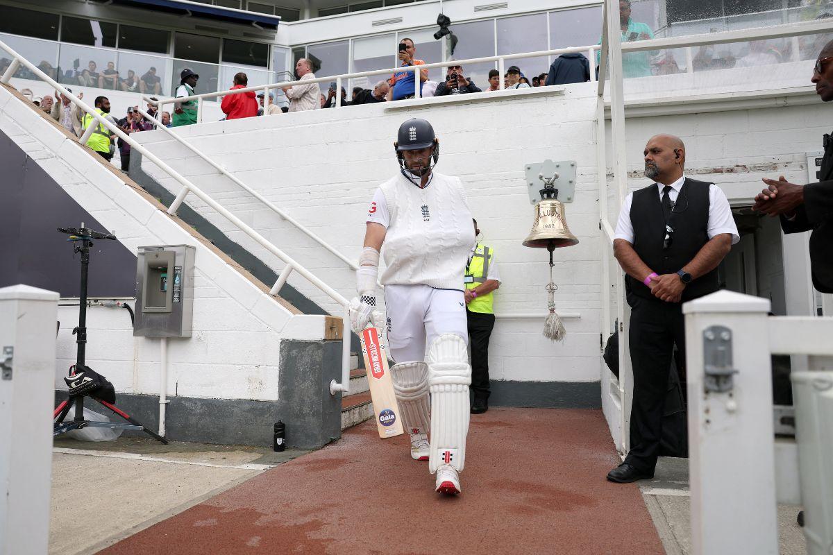 Chris Woakes walks out to bat