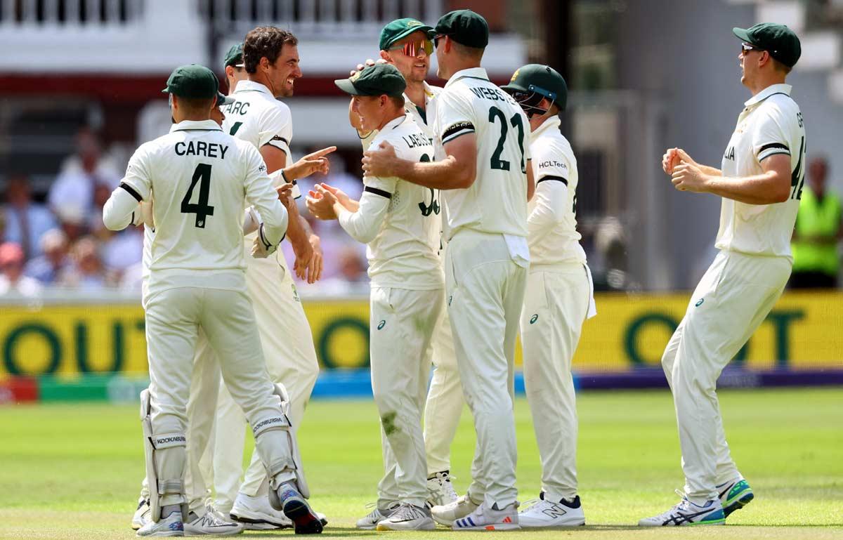 Australia's players celebrate a wicket Australia's players celebrate a wicket
