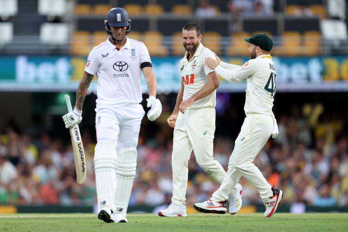 Australia's Michael Neser celebrates after taking the wicket of England's Brydon Carse during the Second Ashes Test at The Gabba in Brisbane, on Sunday