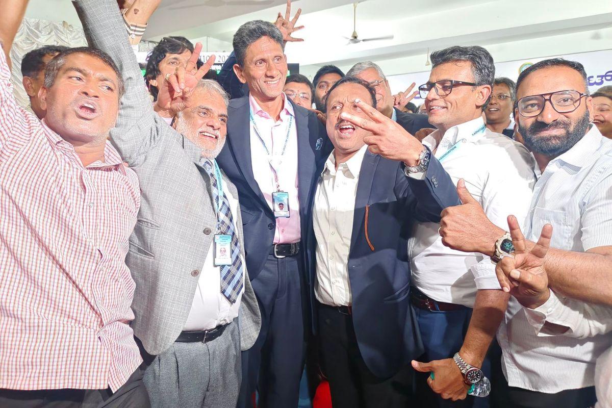 Venkatesh Prasad (centre) celebrates with his supporters after winning the KSCA polls on Sunday