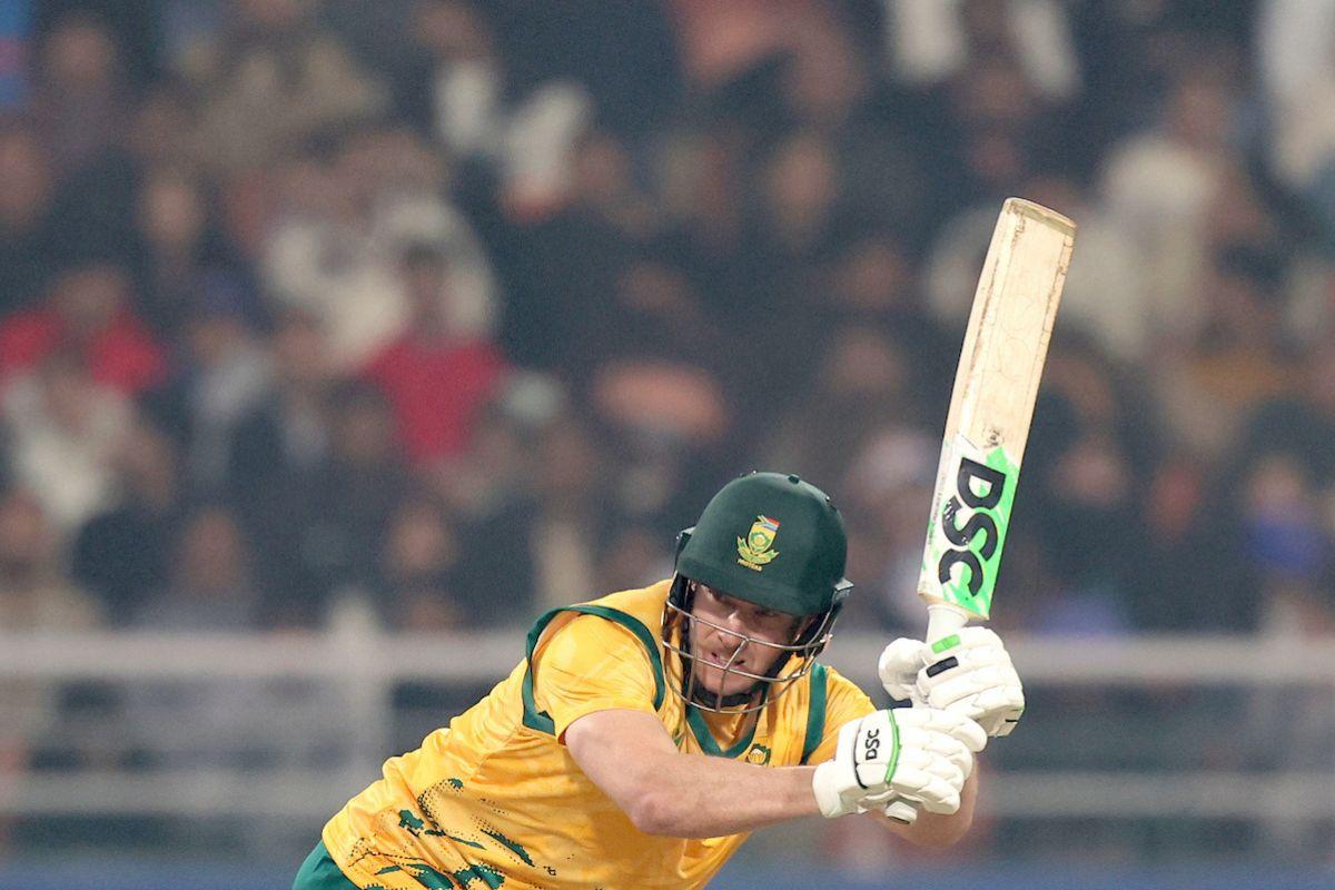 David Miller plays a shot