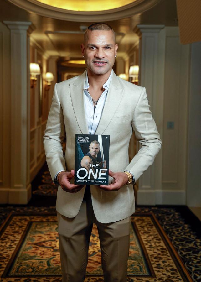 Former India opener Shikhar Dhawan at the launch of his autobiography 'The One: Cricket, My Life and More', in New Delhi on Sunday.