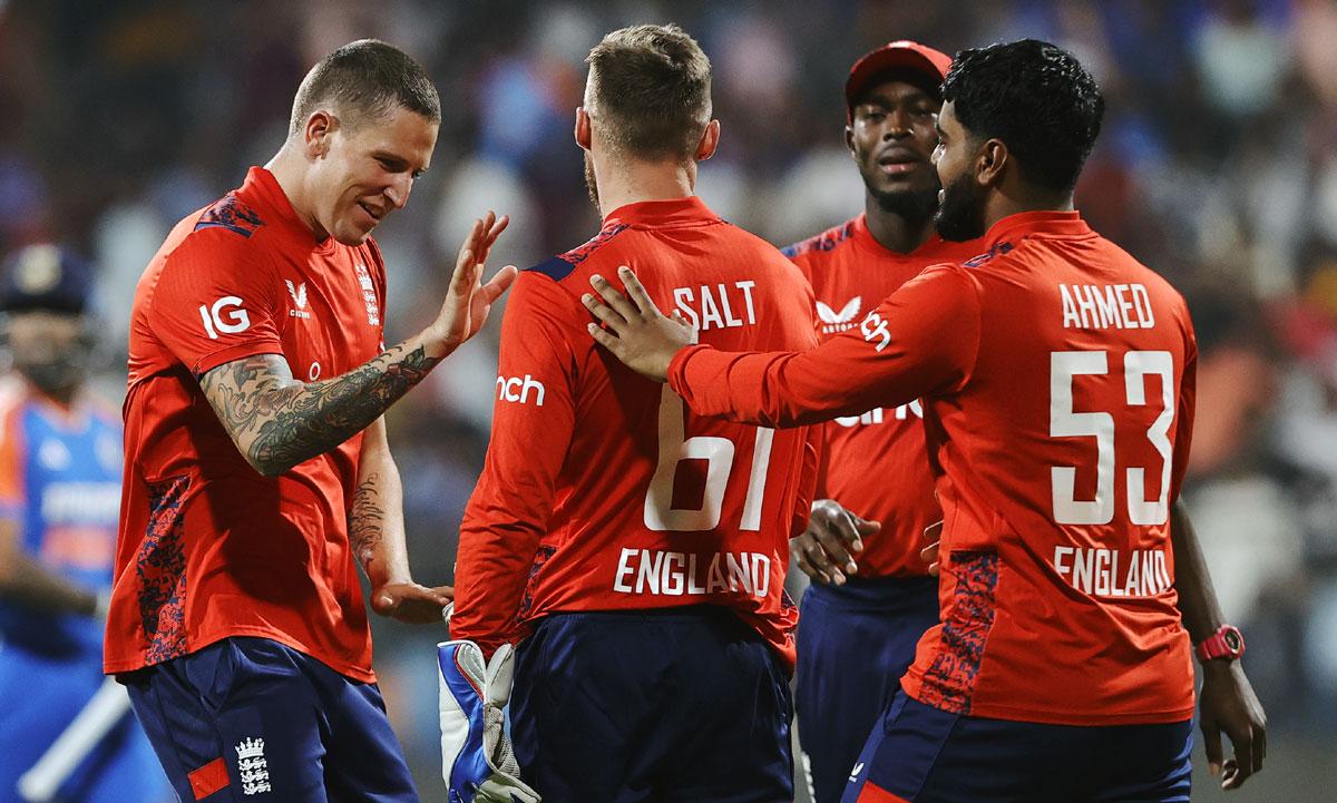 Brydon Carse celebrates with his England teammates after dismissing Suryakumar Yadav.