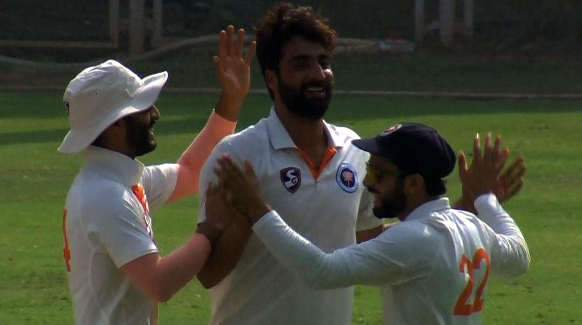 Jammu and Kashmir's players celebrate a wicket