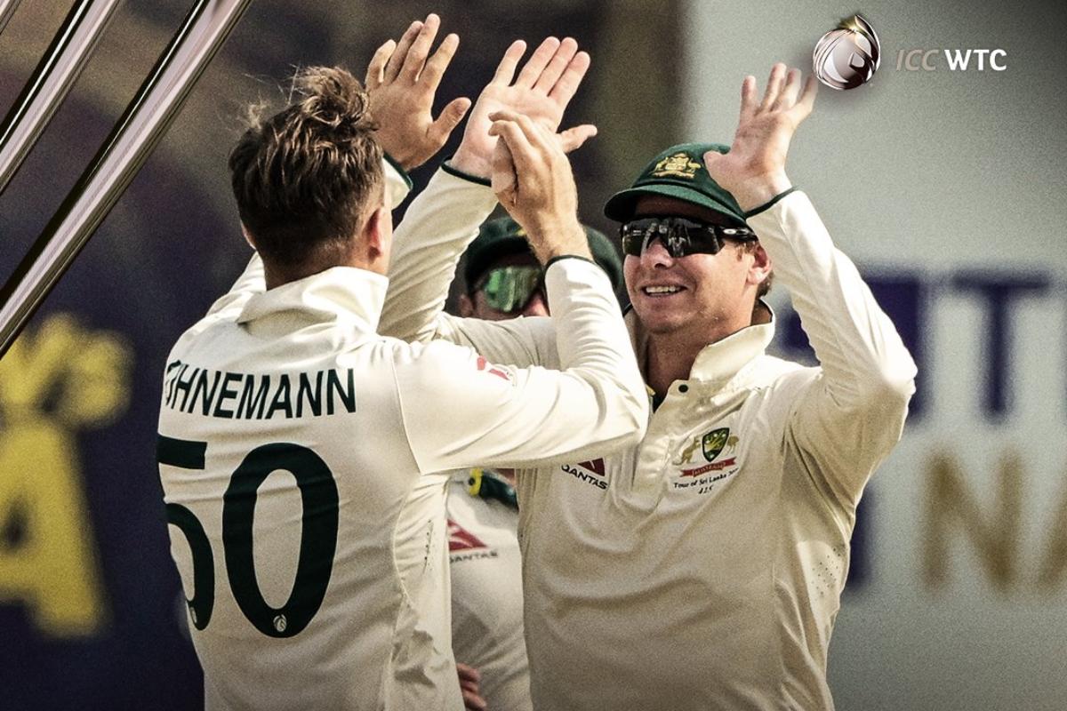 Kuhnemann celebrates a wicket with Steve Smith