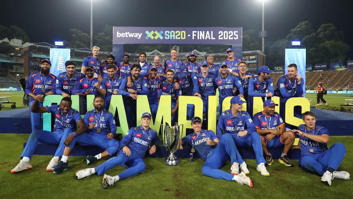 The triumphant MI CapeTown players pose with the SA20 trophy after beating Sunrisers Eastern Cape in the final at the Wanderers, in Johannesburg, on Saturday.