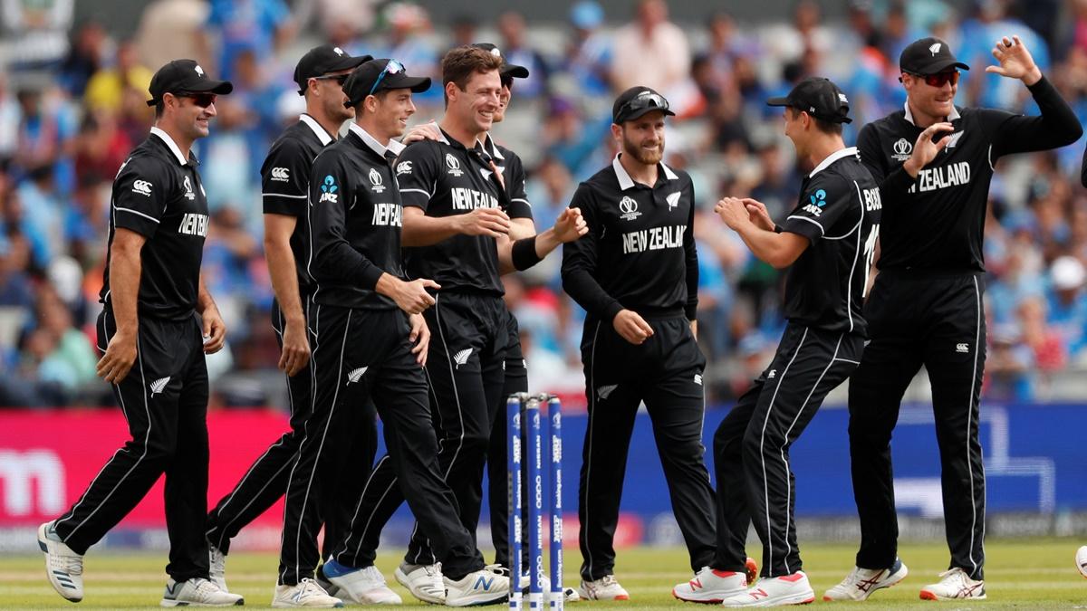 New Zealand's players celebrate the fall of a wicket