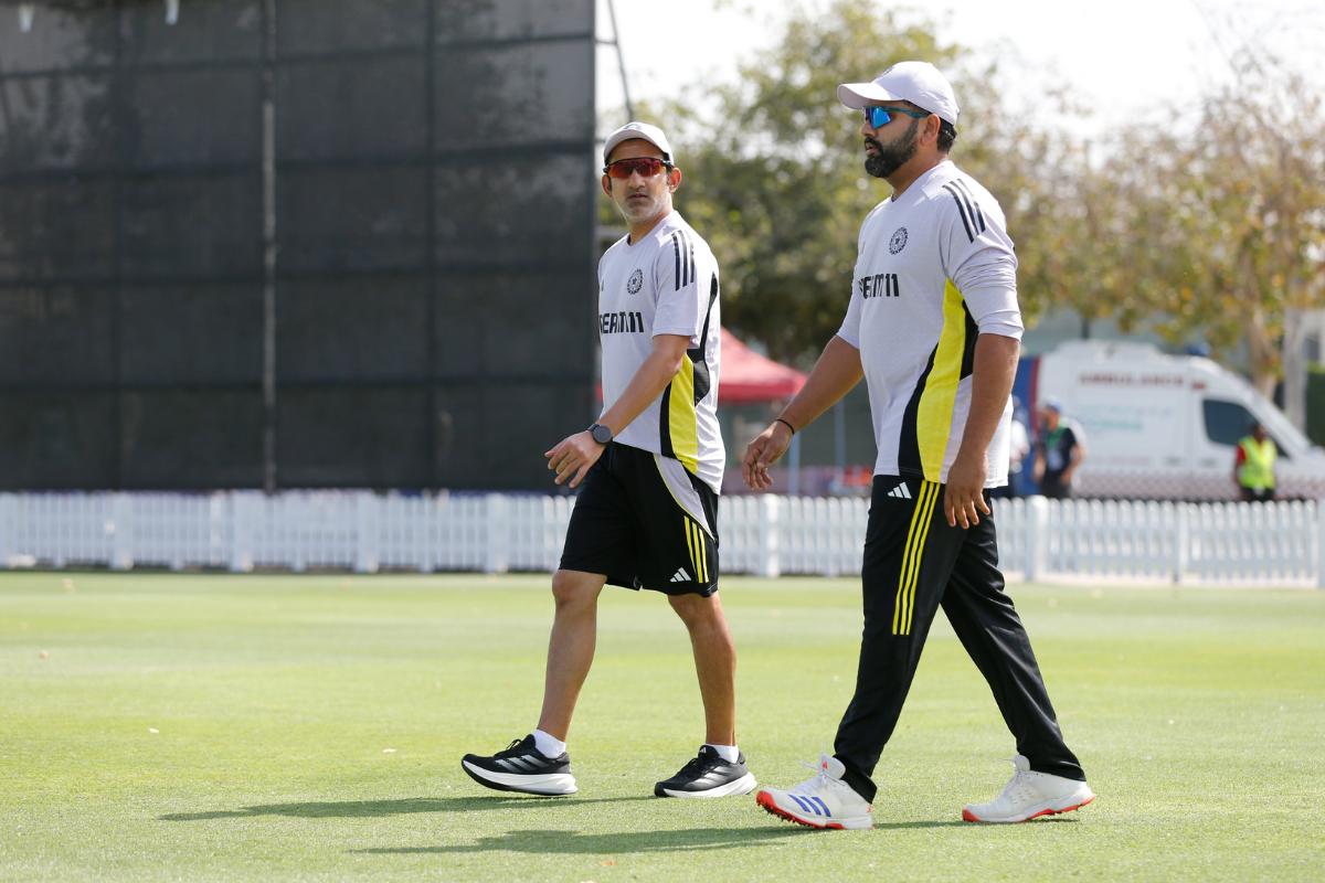 Indian Head Coach Gautam Gambhir and captain Rohit Sharma walk out for practice in Dubai on Sunday