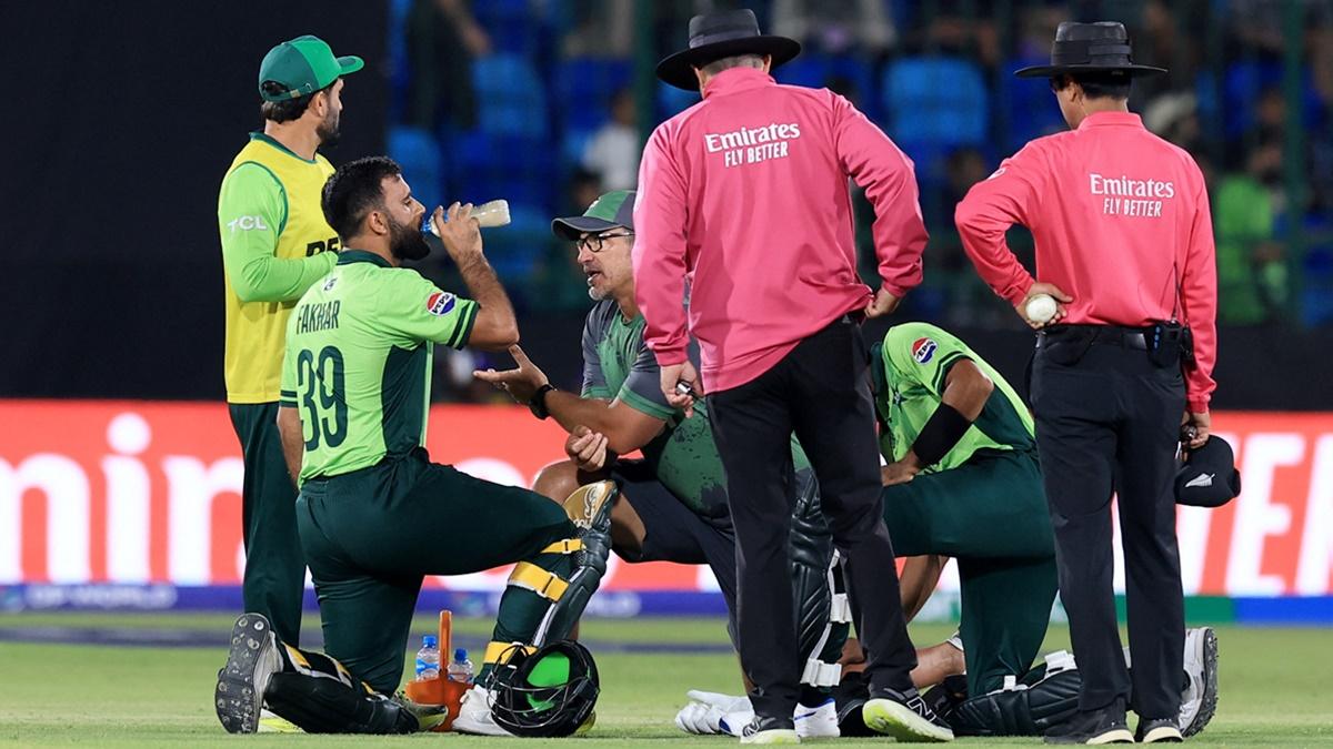 Pakistan's Fakhar Zaman receives medical attention during the opening match of the ICC Champions Trophy against New Zealand, at National stadium, Karachi, on Wednesday.