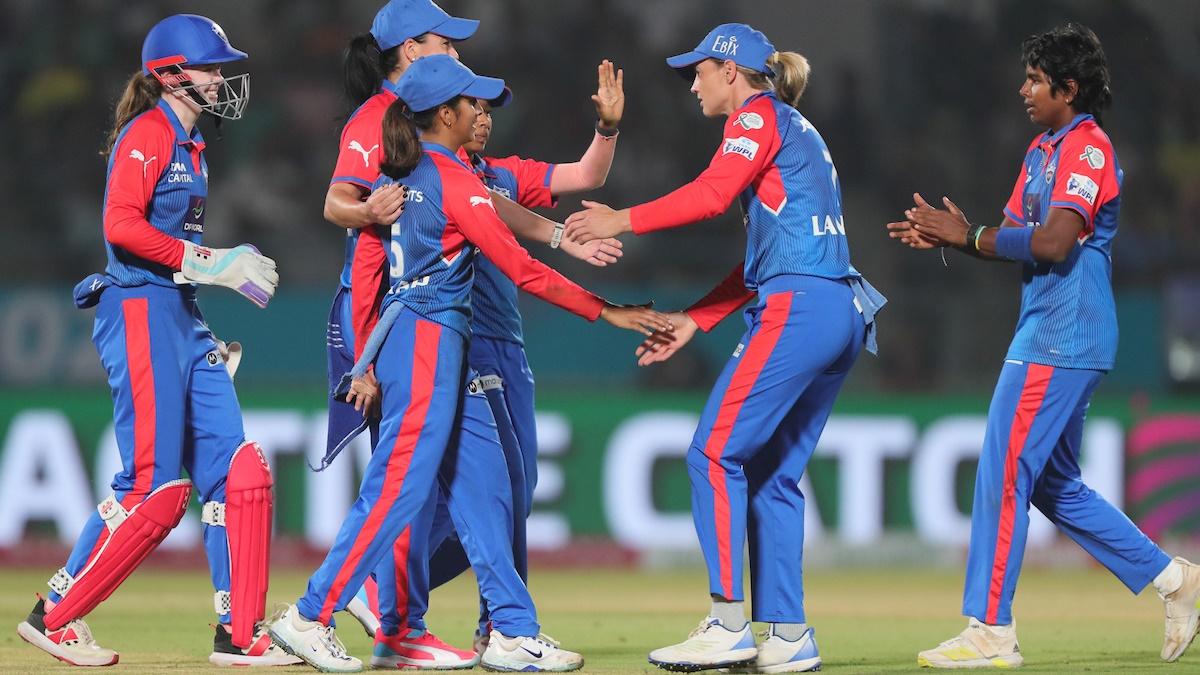 Delhi Capitals players celebrate the wicket of Dani Wyatt-Hodge of Royal Challengers Bangalore in the Women's Premier League 2025 match at the BCA stadium, Vadodara, February 17, February 2025.