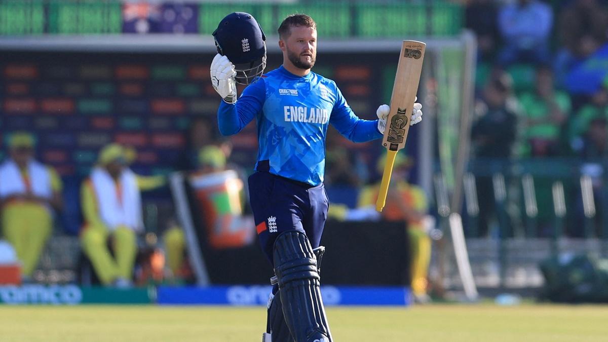 England's Ben Duckett celebrates completing his century during the ICC Champions Trophy Group B mach against Australia, at Gaddafi Stadium, Lahore, on Saturday.