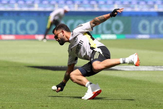 India's Virat Kohli during the warm up before the match against Pakistan in their ICC Men's Champions Trophy Group A  match at Dubai International Stadium, Dubai, United Arab Emirates 