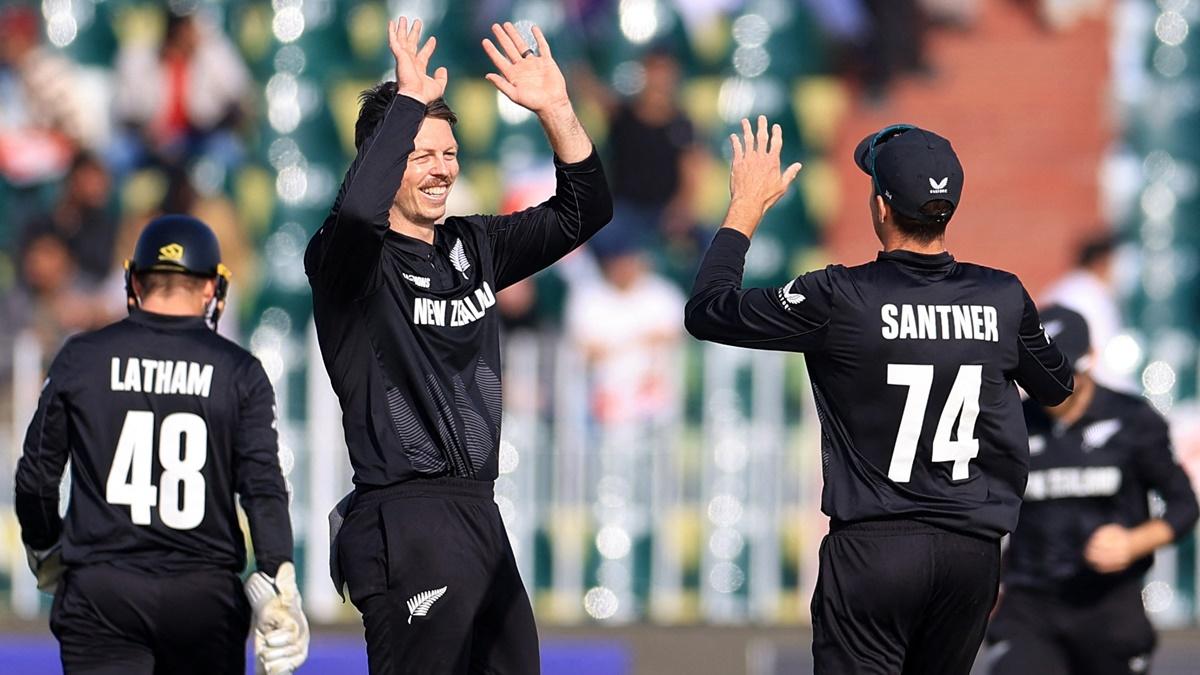 New Zealand spinner Michael Bracewell celebrates with skipper Mitchell Santner after dismissing Bangladesh's Towhid Hridoy during the Champions Trophy Group A match at Rawalpindi Cricket Stadium, Pakistan, on Monday.