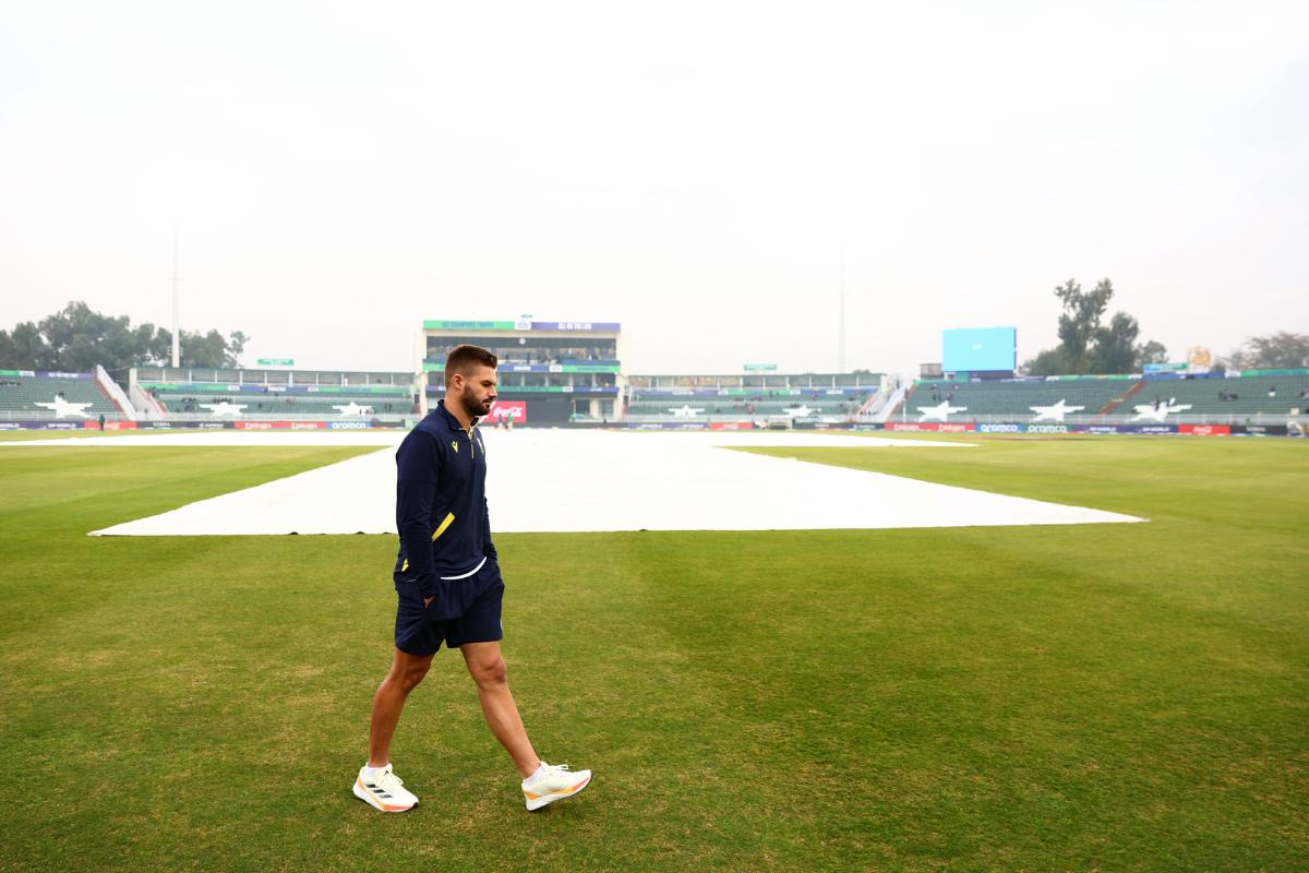 South Africa batter Aiden Markram walks as the rain pours down in Rawalpindi on Tuesday