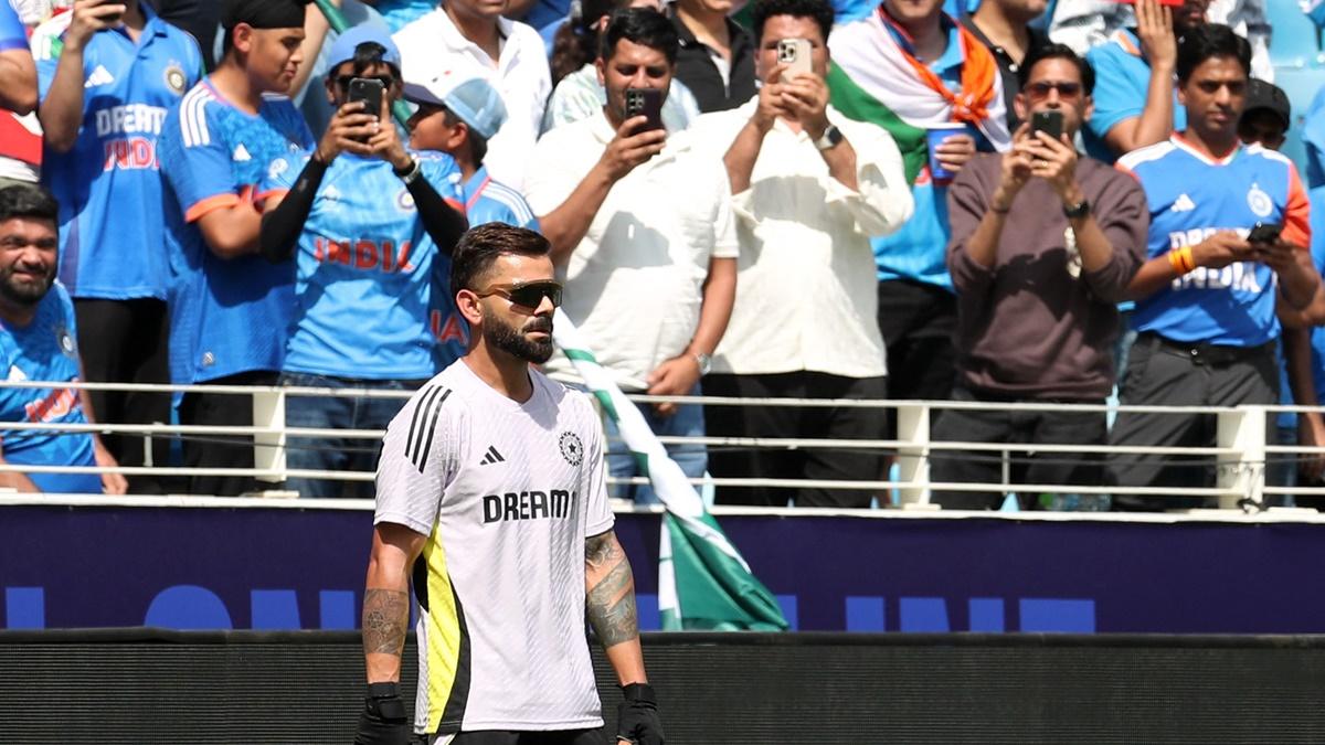 Virat Kohli warms up before the Champions Trophy Group A match between India v Pakistan at Dubai International Stadium, UAE, on February 23, 2025.