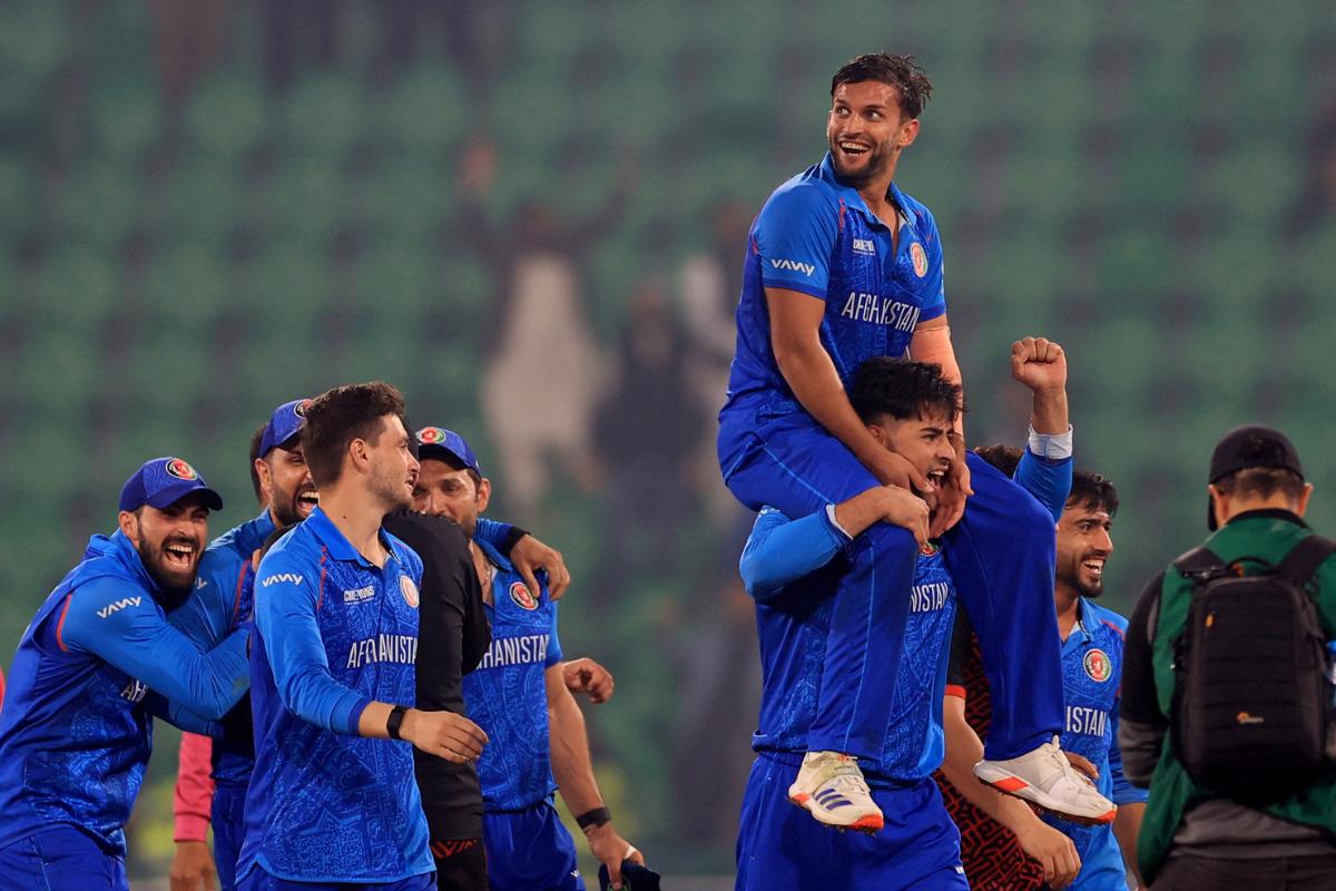 Afghanistan players celebrate after defeating England on Wednesday