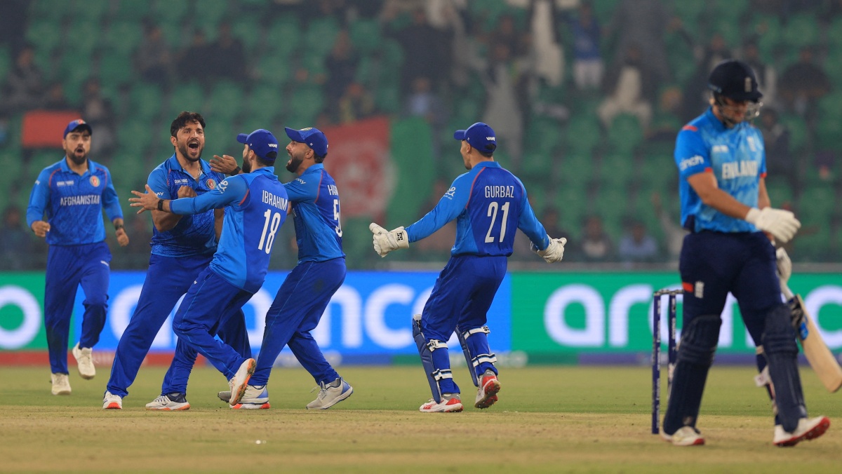 Afghanistan's Gulbadin Naib celebrates taking the wicket of England's Liam Livingstone