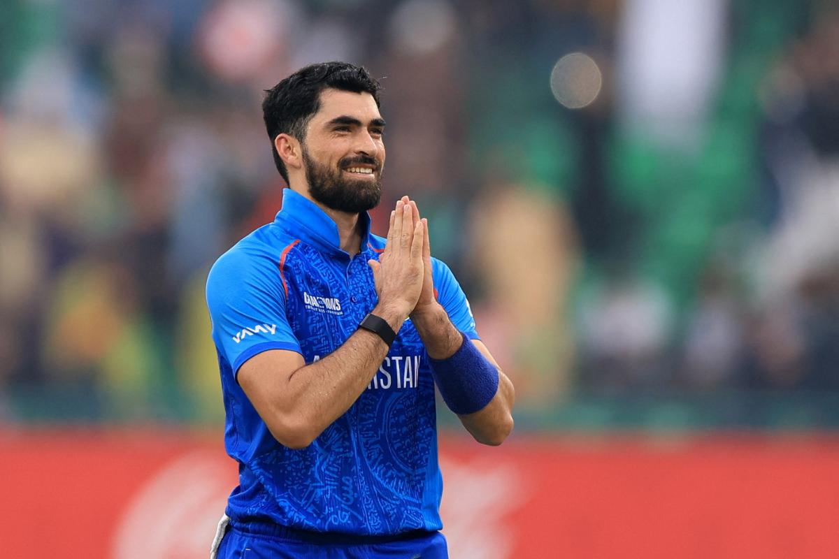 Ibrahim Zadran celebrates his century against England in their ICC Champions Trophy Group B match at the Gaddafi Stadium, Lahore, on Wednesday