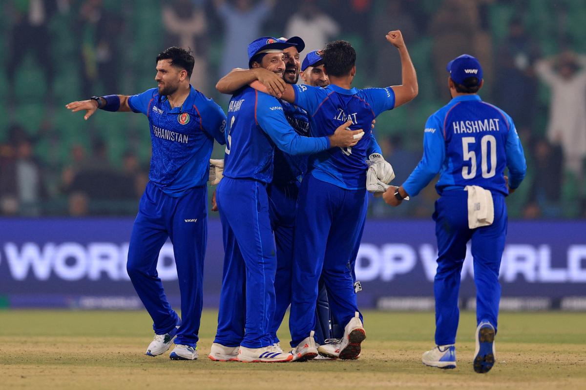 The Afghanistan team celebrates their victory over England on Wednesday