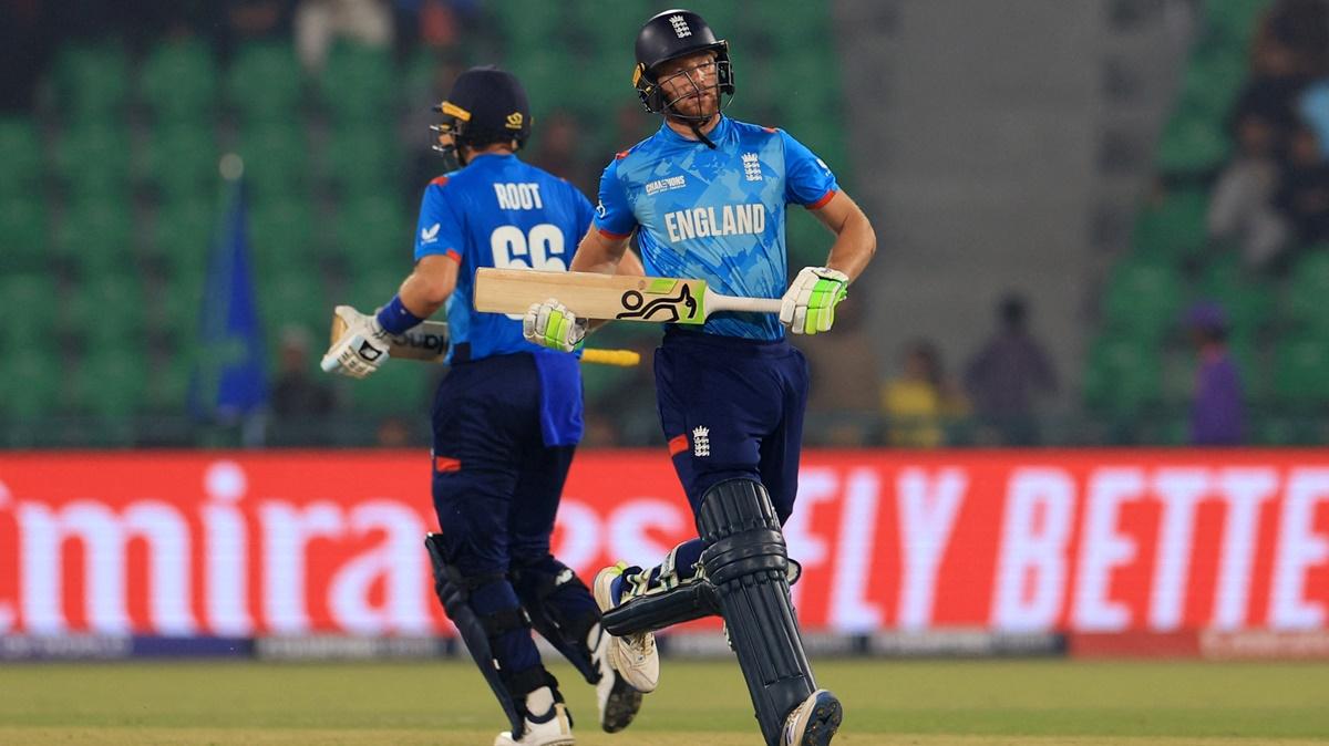 England's Jos Buttler and Joe Root steal a quick single during the Champions Trophy Group B match against Afghanistan, at Gaddafi Stadium, Lahore.