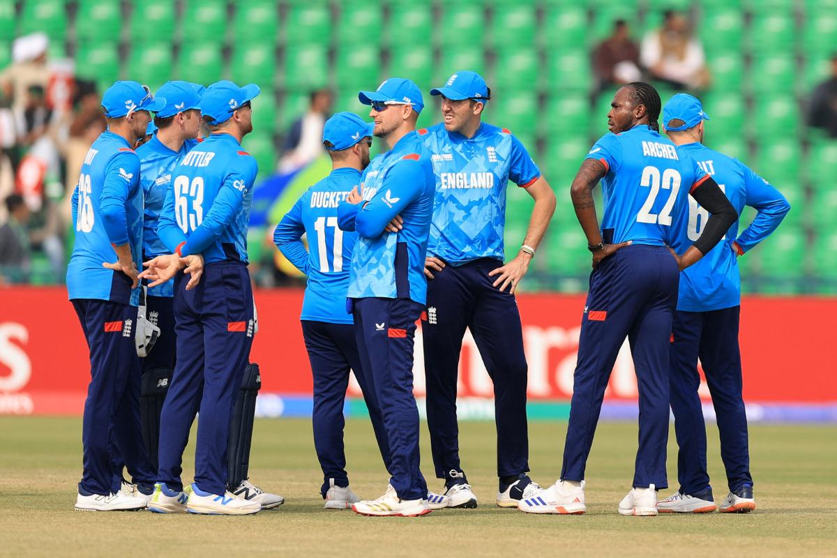  England's Jofra Archer awaits for the DRS review with teammates after taking the lbw wicket of Afghanistan's Sediqullah Atal 