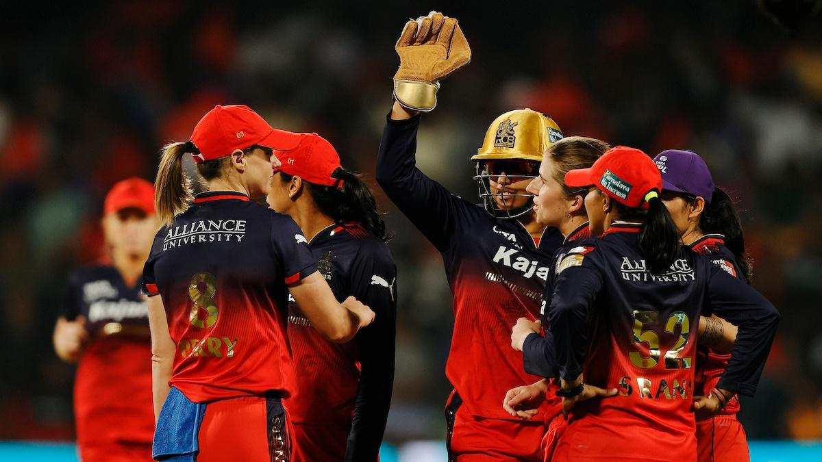 Royal Challengers Bangalore players celebrate dismissing Harleen Deol of Gujarat Giants during the Women's Premier League 2025 match at the M.Chinnaswamy Stadium, Bengaluru, on Thursday.