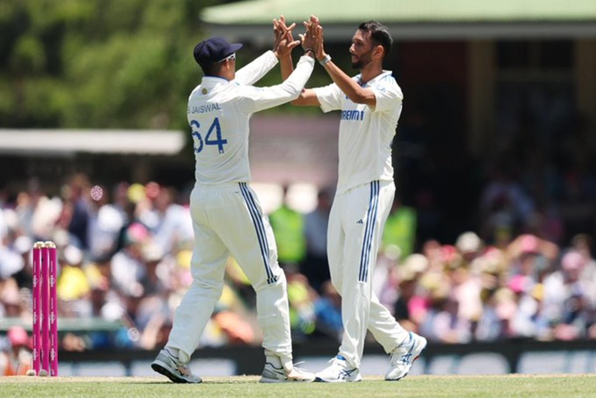 Prasidh Krishna celebrates with Yashasvi Jaiswal, who took the catch to dismiss Beau Webster.