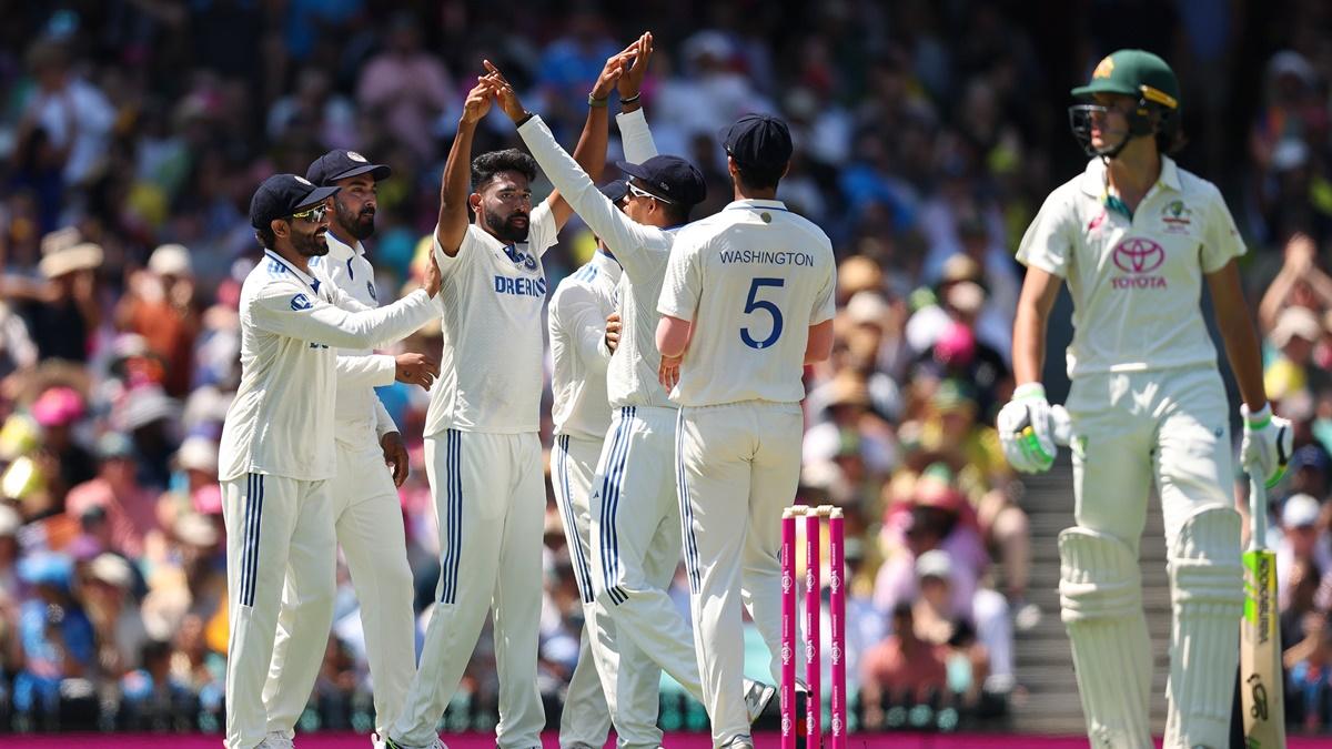 Mohammed Siraj celebrates with his India teammates after having Sam Konstas caught by  Yashasvi Jaiswal in Australia's first innings.