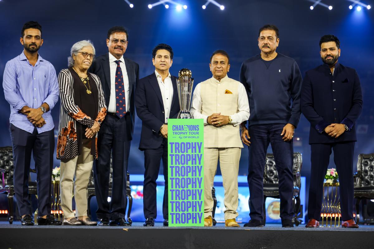 Mumbai and Indian cricket's stars Ajinkya Rahane, Diana Eduljee, Dilip Vengsarkar, Sachin Tendulkar, Sunil Gavaskar, Ravi Shastri and Rohit Sharma with the Champions Trophy in Mumbai, during  the Wankhede Stadium's 50 year celebration on Sunday