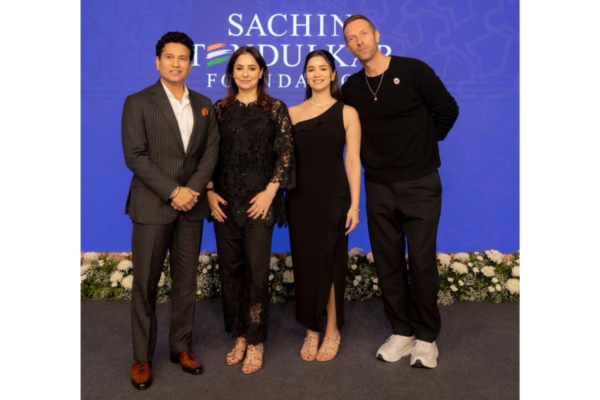 Sachin Tendulkar, Anjali Tendulkar and Sara Tendulkar with Coldplay's Chris Martin at the Sachin Tendulkar Foundation event in Mumbai on Wednesday