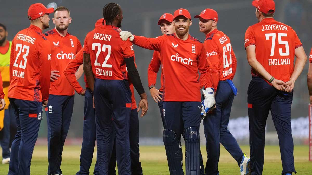 England's players celebrate a wicket