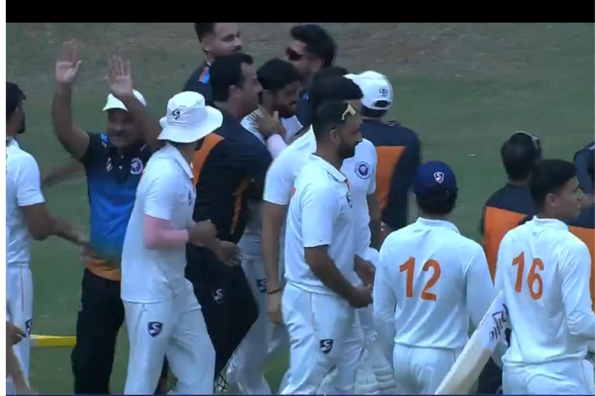 Jammu and Kashmir's players and support staff celebrate on defeating Mumbai in their Ranji Trophy match on Saturday