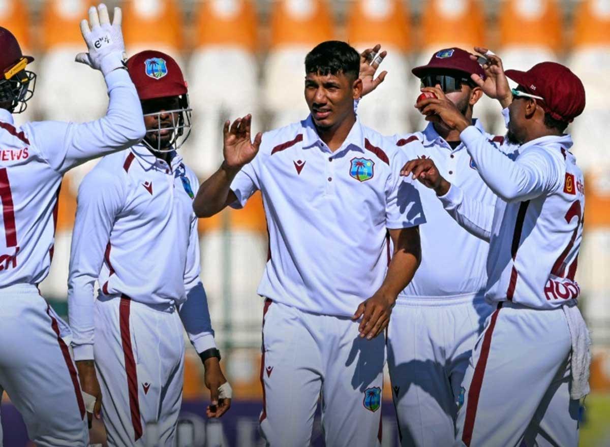 West Indies's players celebrate a wicket