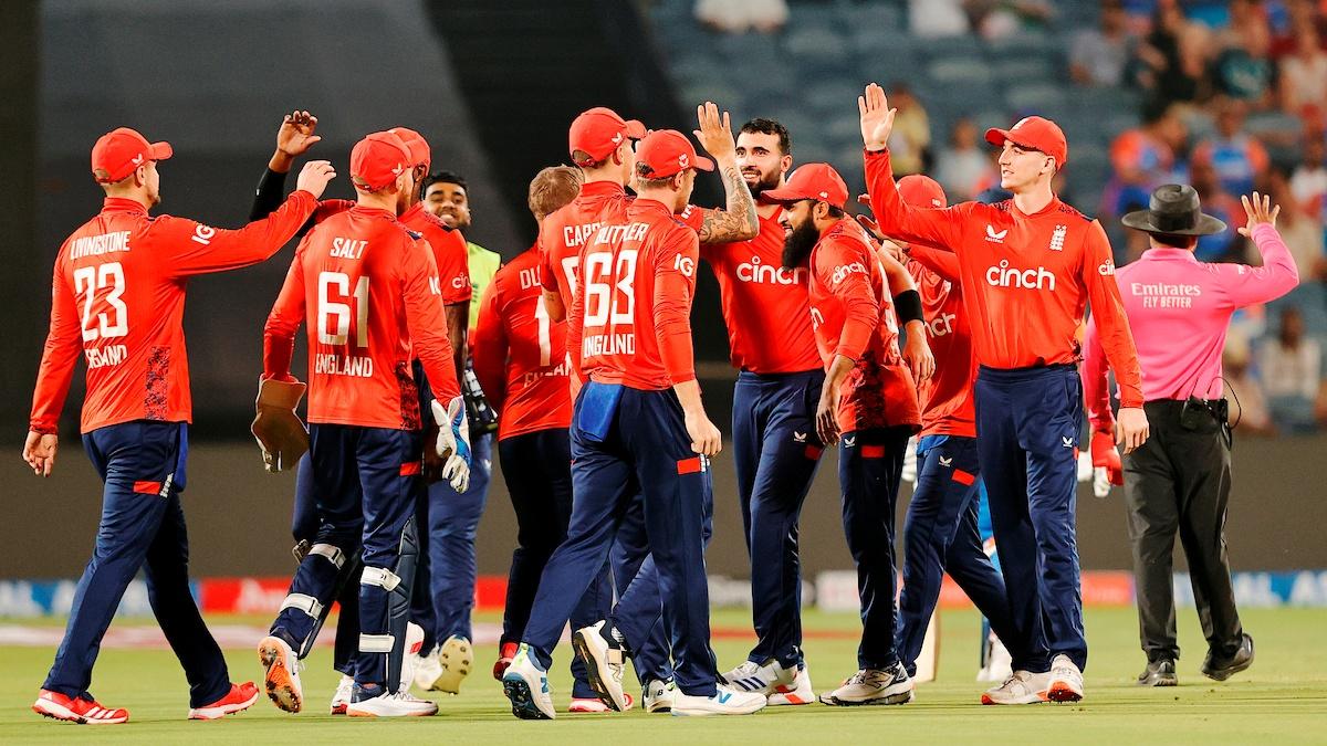 England players celebrate after dismissing India opener Sanju Samson early.