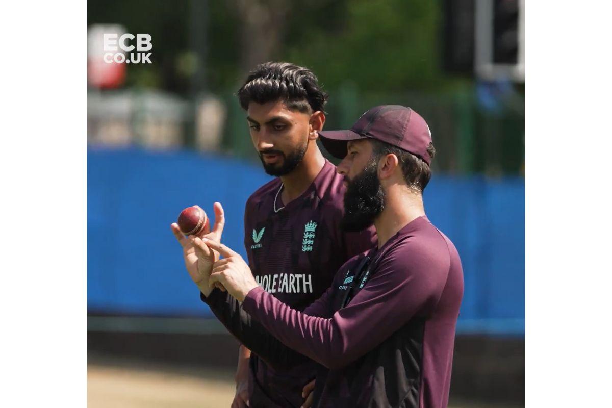 Mooen Ali shares some pointers with Shoaib Bashir in the nets on Monday
