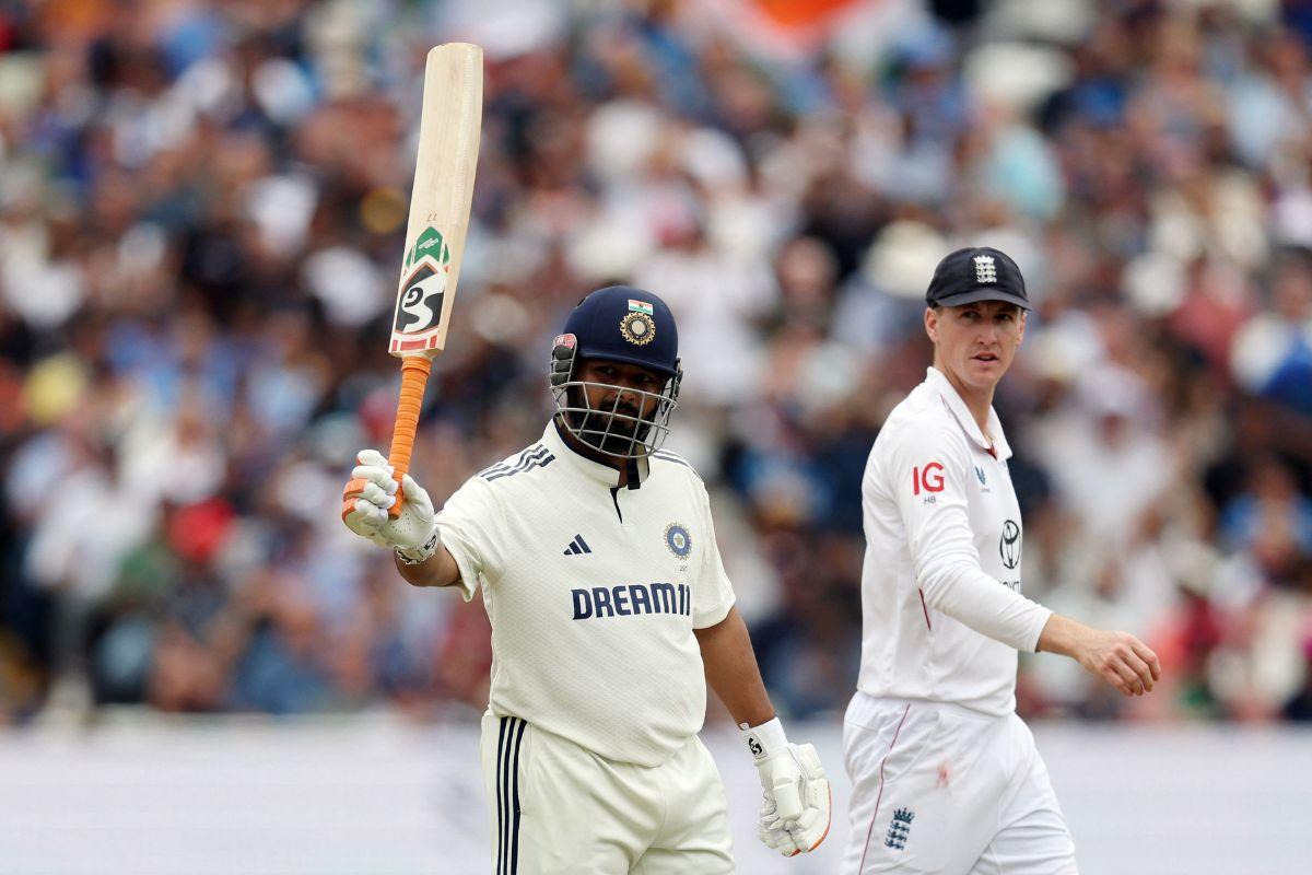 India's Rishabh Pant celebrates after reaching his half century