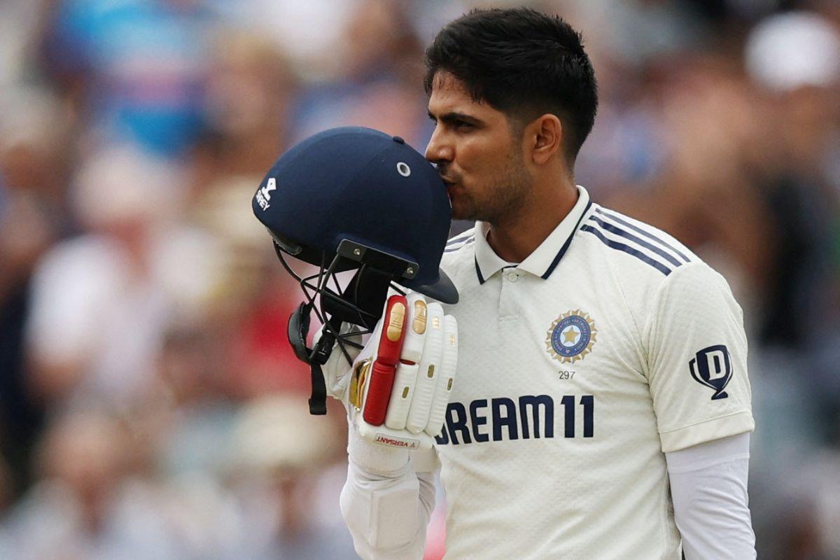  India's Shubman Gill kisses his helmet and celebrates his century on Day 4 of the 2nd Test on Saturday