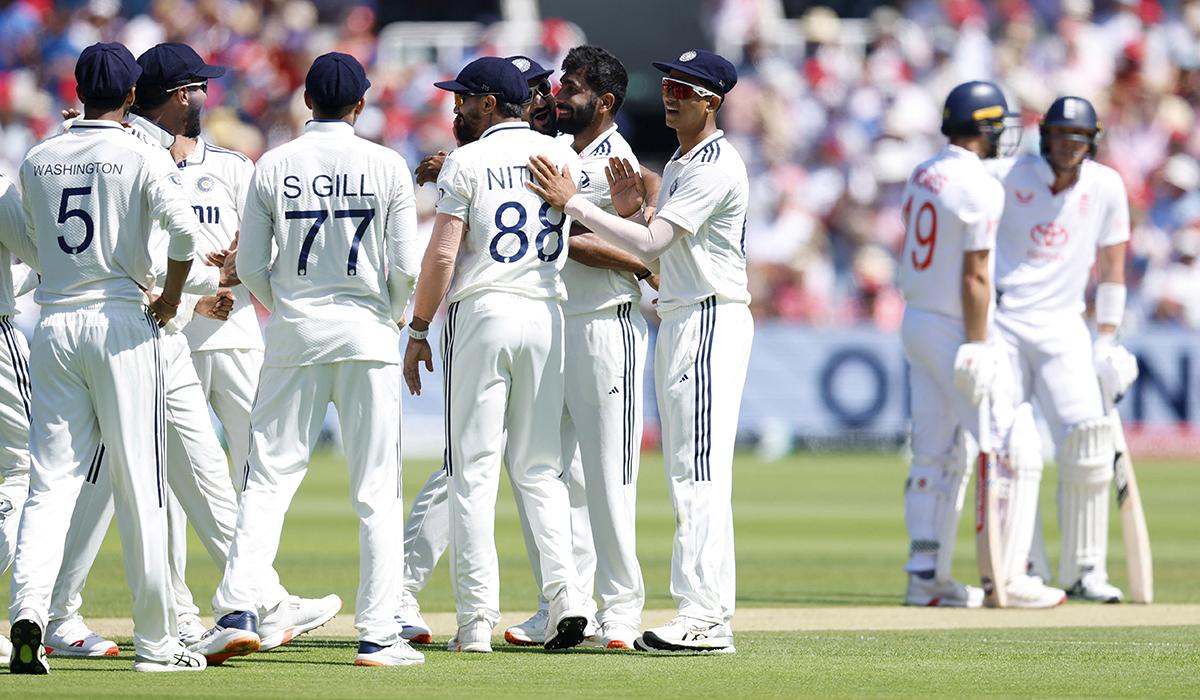 Chris Woakes is given out caught behind on the review off the bowling of Jasprit Bumrah.