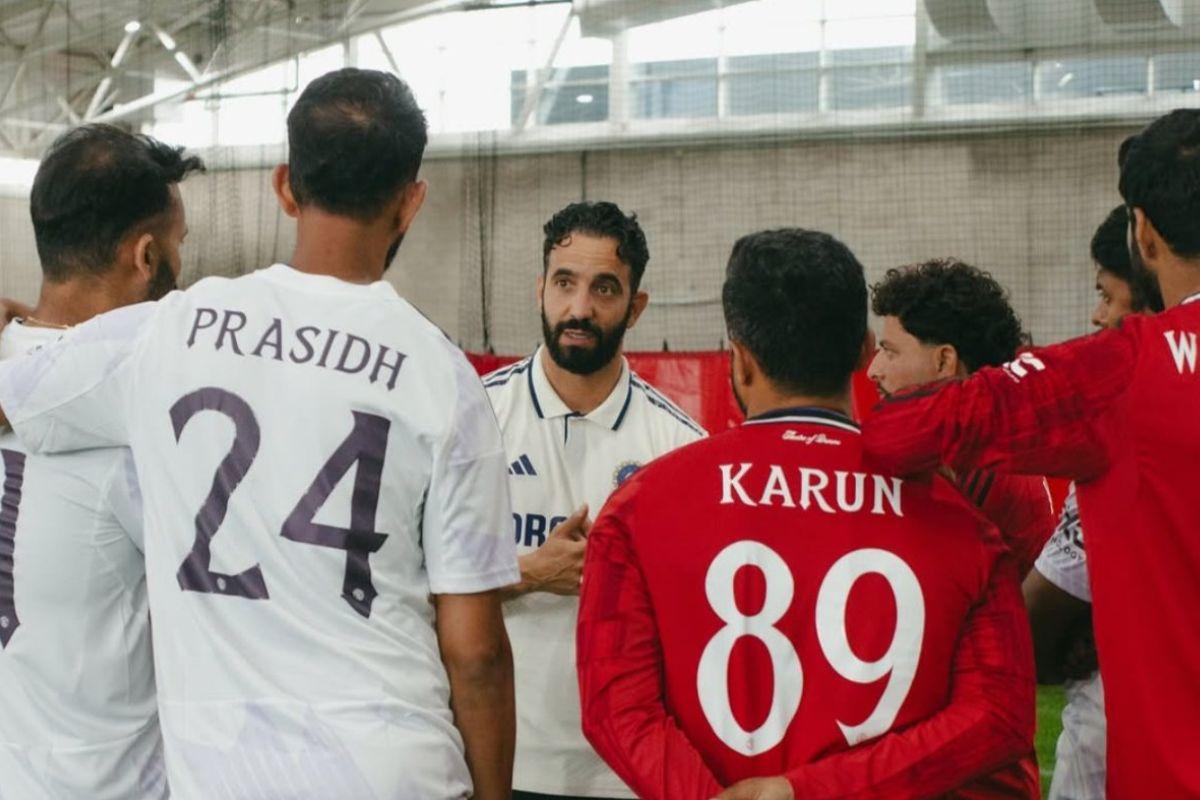 Manchester United coach Ruben Amorim speaks with Indian players