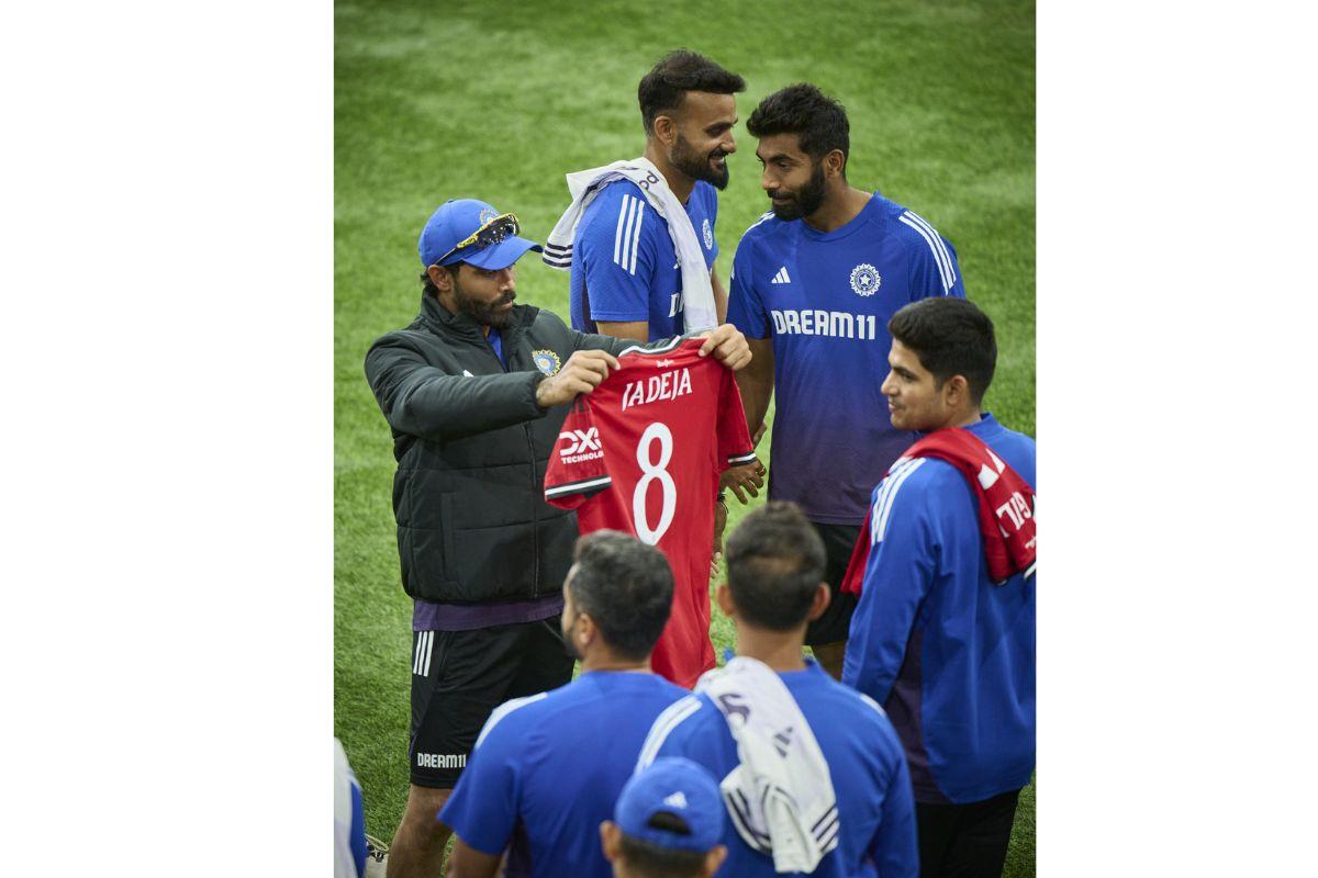 Ravindra Jadeja mingles with his teammates and Manchester United during a meet and greet in Manchester on Sunday