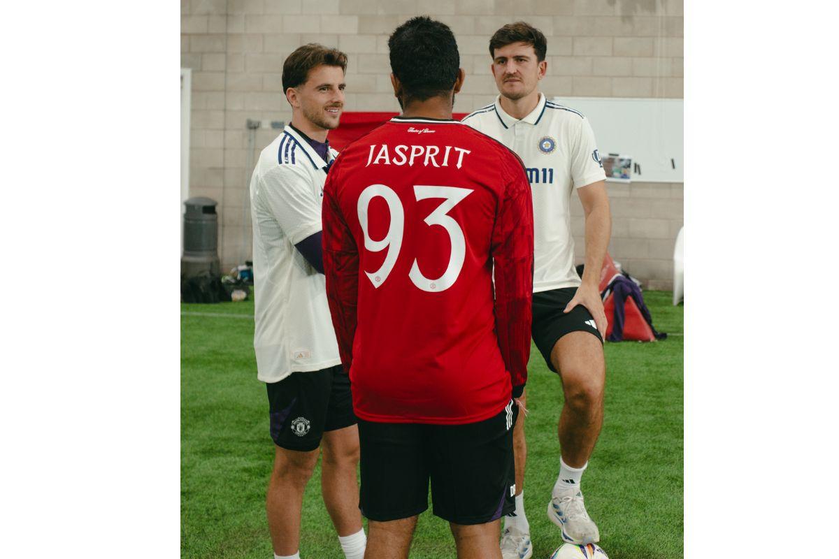 India's Jasprit Bumrah speaks with Mason Mount and Harry McGuire