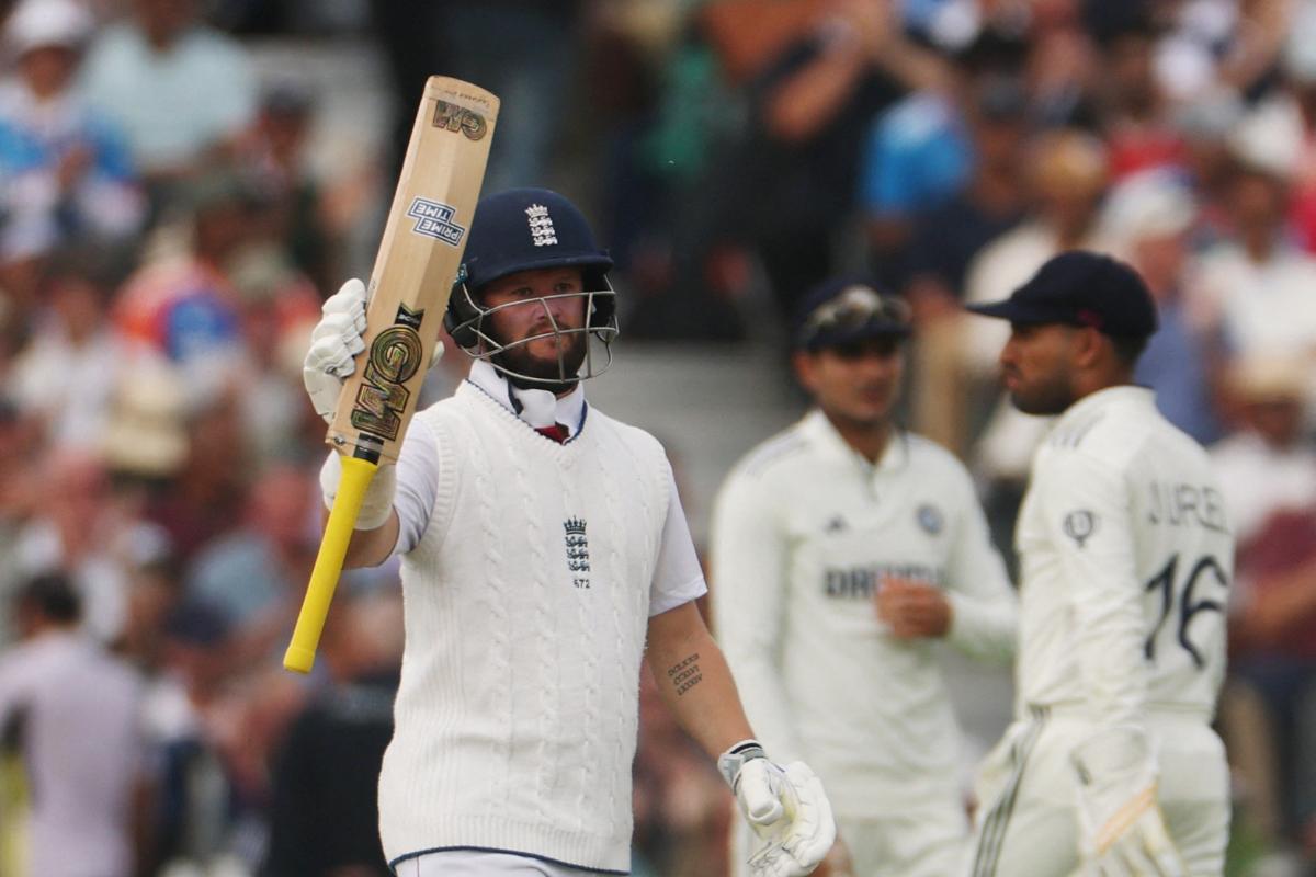 England's Ben Duckett celebrates after reaching his half century