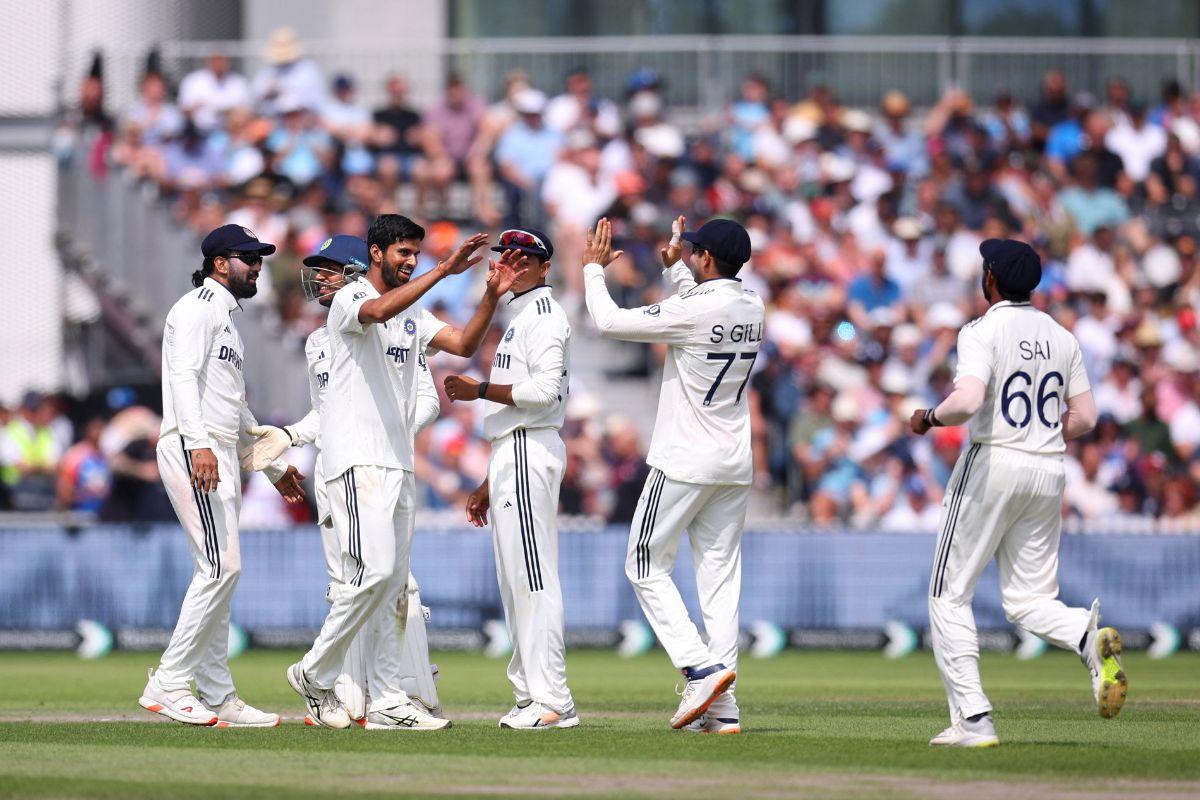 India's Washington Sundar celebrates with teammates after taking the wicket of England's Harry Brook